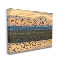 Студената индустрија стадо од птици што летаат езерото рефлексија портокалово зајдисонце галерија завиткана платно печатена